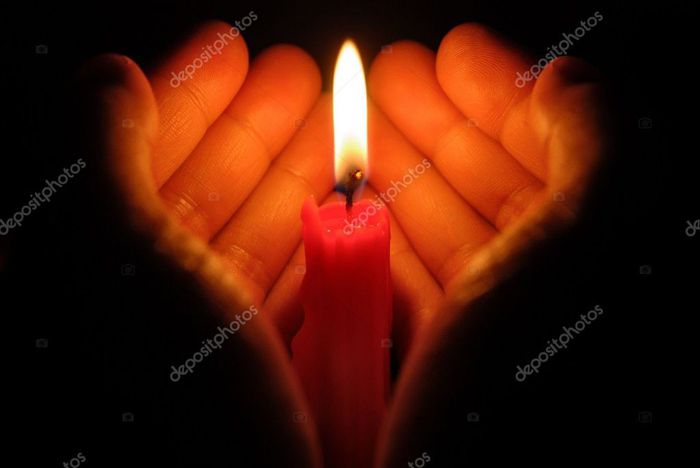 depositphotos_22724789-stock-photo-hands-holding-a-burning-candle